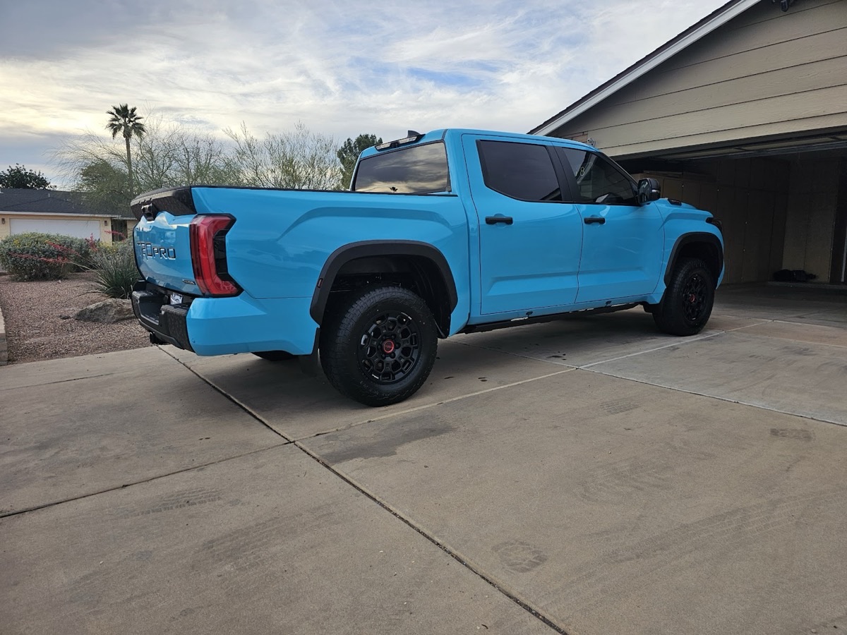 Bright blue Tundra TRD Pro gleaming after a mobile detail